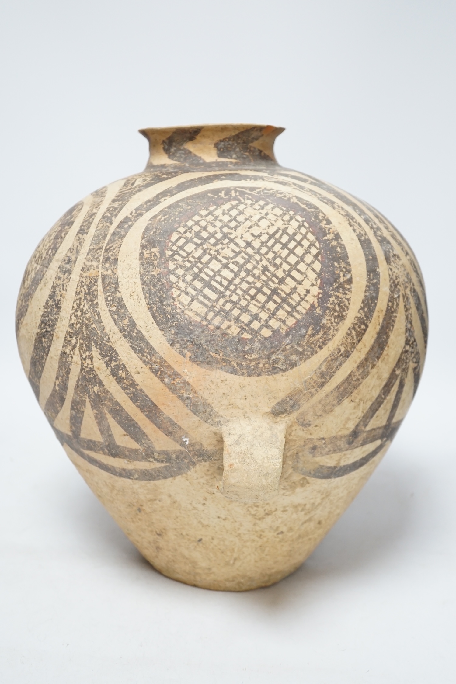 A large Chinese black painted pottery jar, Neolithic, Machang period, with Oxford Thermoluminescence certificate, 33cm